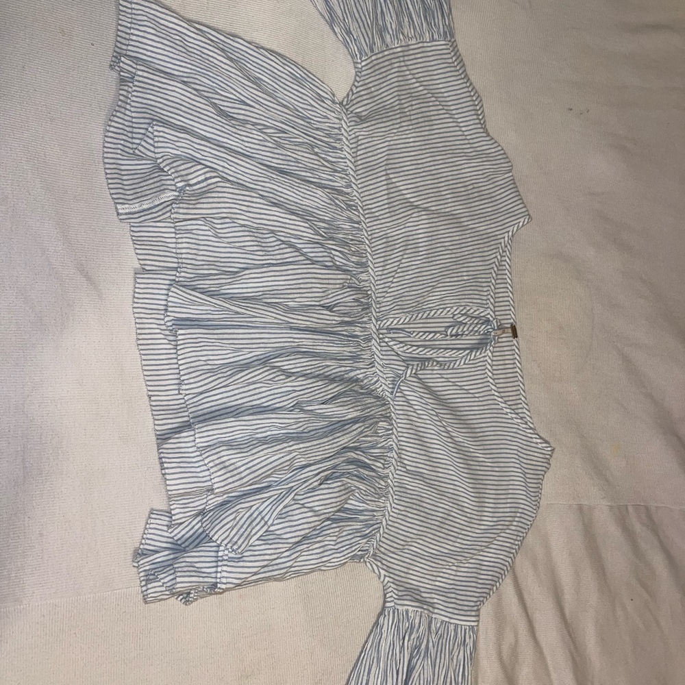 FREE PEOPLE Blouse. SIZE:SM. Light blue and white striped top.